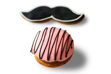 Biscuits with glaze. Confectionery on white background. Moustache cookie and bush cake. Choice of gentleman.