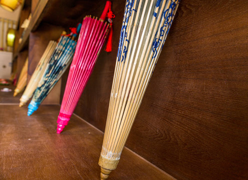 Colorful chinese paper umbrellas in Wuxi nianhuawan park of China. - Powered by Adobe