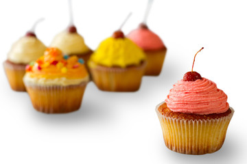 Cupcake with pink frosting. Cherry on top of dessert. Cure from bad mood. Fresh baked confectionery.