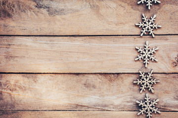 Fototapeta premium Snowflakes On Wood Background, Christmas Snow Flakes, Winter Dec