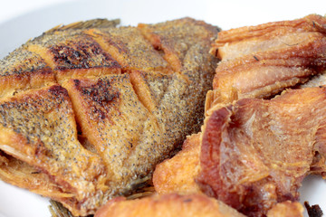 Tasty and spicy fried fish isolated on white background, Thai food