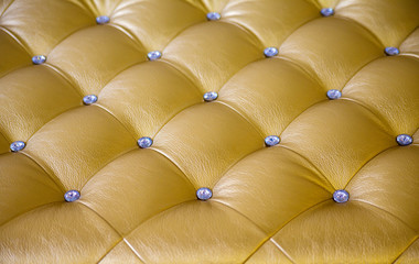 Gold upholstery fabric texture, background