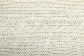 Close-up of a piece of white knit fabric