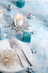 Silver and cream Christmas Table Setting with decorations