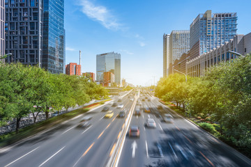 Shanghai street view with cityscape in background.