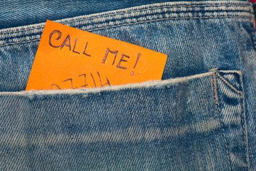 Leaf  in jeans pocket wrote to call and the number