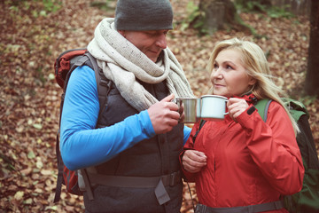 Drinking hot tea to warm up