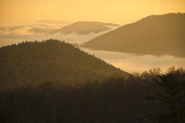 Valley full of colorful clouds and last sunset light - wonderful nature scenery