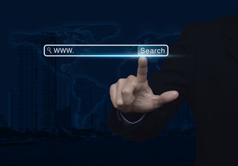 Businessman hand pressing search www button over map and city to