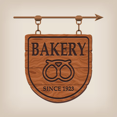 Vintage wooden bakery sign bakery. Vector illustration.