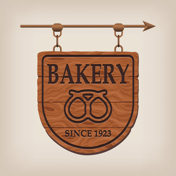 Vintage wooden bakery sign bakery. Vector illustration.