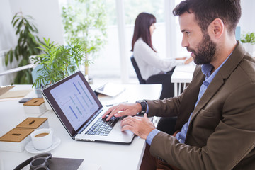 Fototapeta premium Man and woman working in office