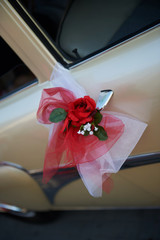 wedding car decorated with a rose flower