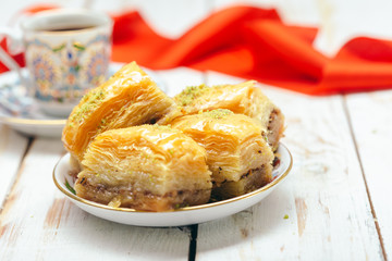  traditional eastern desserts on wooden background
