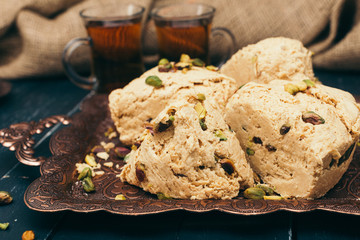  traditional eastern desserts on wooden background