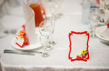 reserved table for a wedding dinner and invitation card