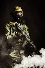 The man in the image of a member of the special forces with weap