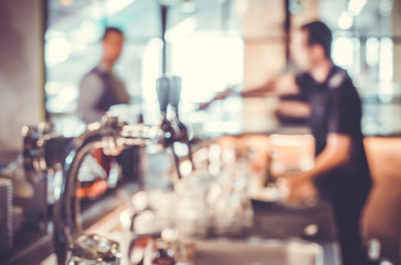 abstract blurred background with restaurant interior and people