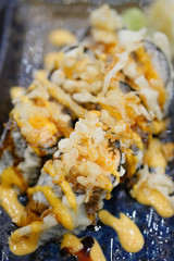 sushi with crispy deep fried tempura seaweed roll