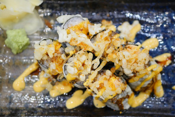 sushi with crispy deep fried tempura seaweed roll