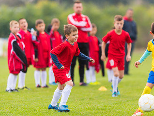 Fototapeta premium Boy Shooting at Goal