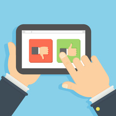 Tablet with like buttons. Hands holding tablet with like gestures buttons on the screen. Concept of social networks, sharing.