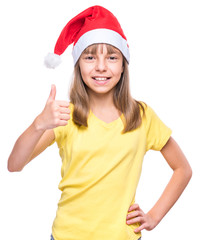 Cute girl wearing Santa Claus hat