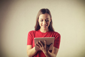 Fototapeta premium Tapping on a tablet