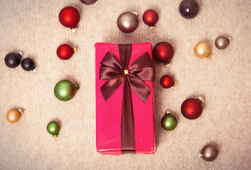 Christmas gift and color baubles
