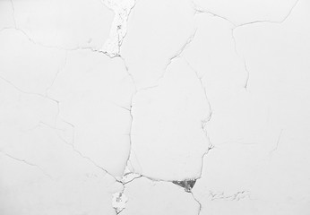 white wall with cracks
