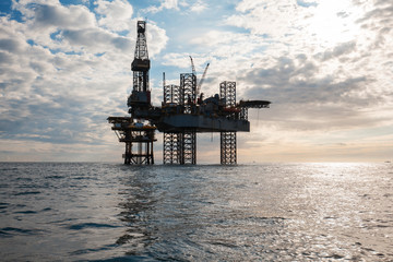 Silhouette of offshore oil installation 