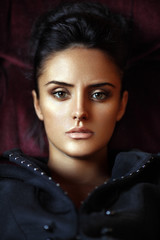 Naklejka premium Fashion beauty portrait of brunette girl with modern hairstyle.