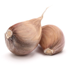 Two garlic cloves isolated on white background cutout