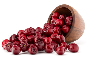 cherry berries in wooden bowl