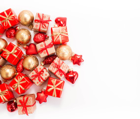 Christmas or New Year background: gifts, colored glass balls, decoration on white background