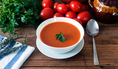 hot fresh homemade tomato soup with thyme, top view