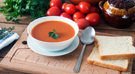 hot fresh homemade tomato soup with thyme, top view