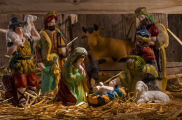 Fototapeta na wymiar Nativity scene with hand-colored figures