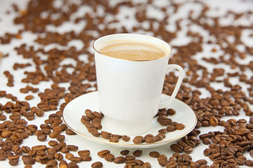 coffee in coffee cup with natural grains