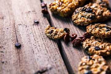 Set of sweets. Chocolate bars and granola on a wooden background with milk chocolates. Food, candy, snack