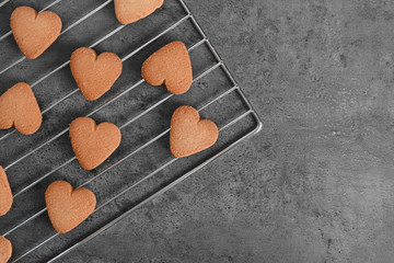 Freshly baked cookies on tray rack