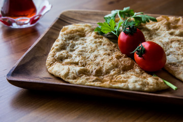 Turkish Cig Borek / Tatar Pie with minced meat and tea..