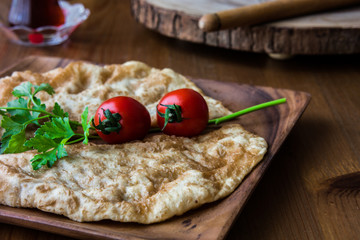 Turkish Cig Borek / Tatar Pie with minced meat and tea..