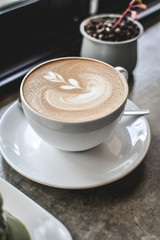 hot coffee latte art in coffee shop.selective