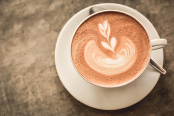 hot coffee latte art in coffee shop.selective