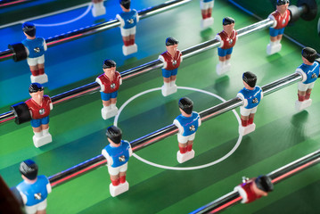 Soccer table game. Football players close up view