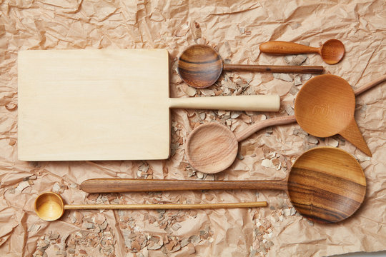 wooden kitchen utensil on baking paper