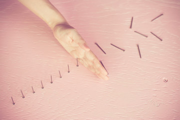 Close up woman hand stopping the nail effect, Image executive and risk control concept