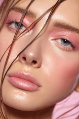 Portrait of girl with bright pink make-up.