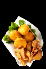 fried chickpea patties, potato wedges. healthy fast food isolate
